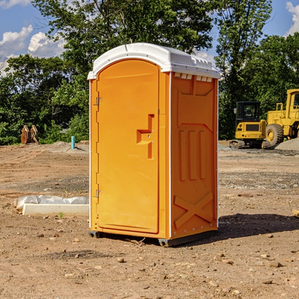 how often are the porta potties cleaned and serviced during a rental period in Haywood County